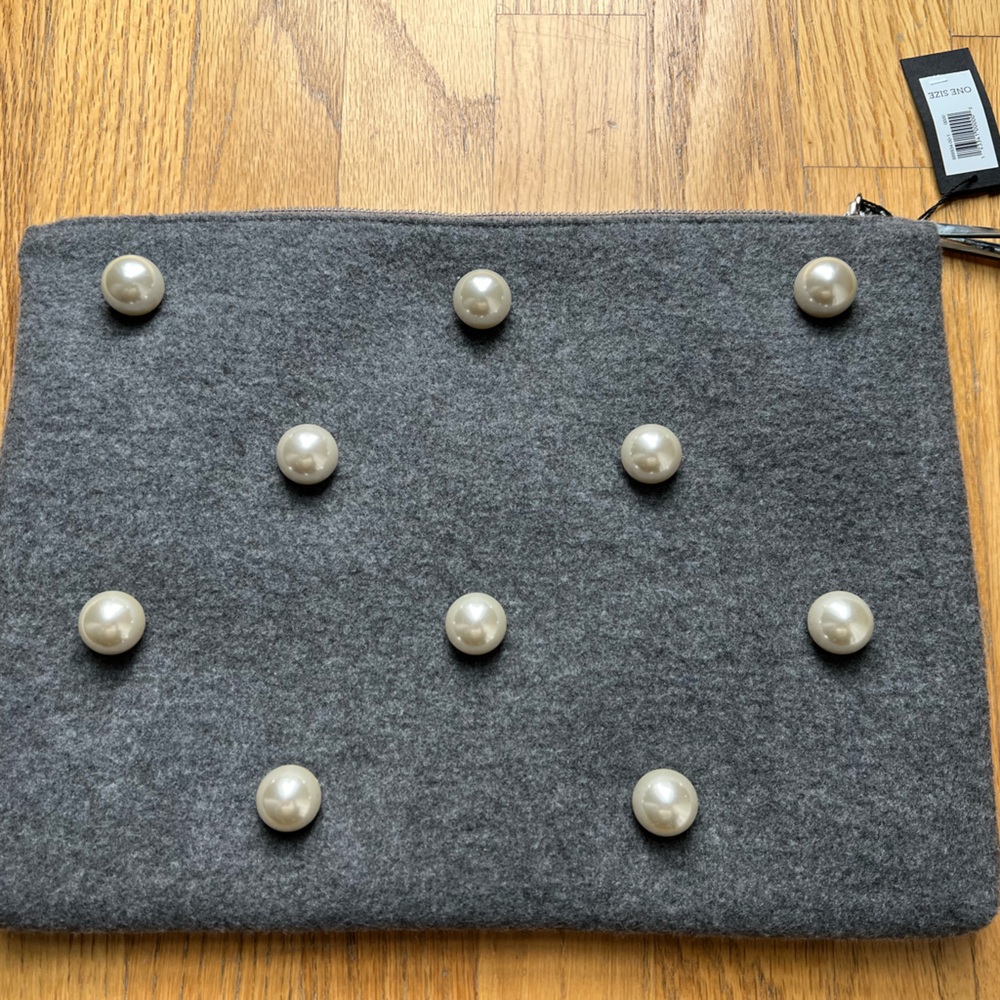 Banana Republic gray flannel clutch with pearl detail.